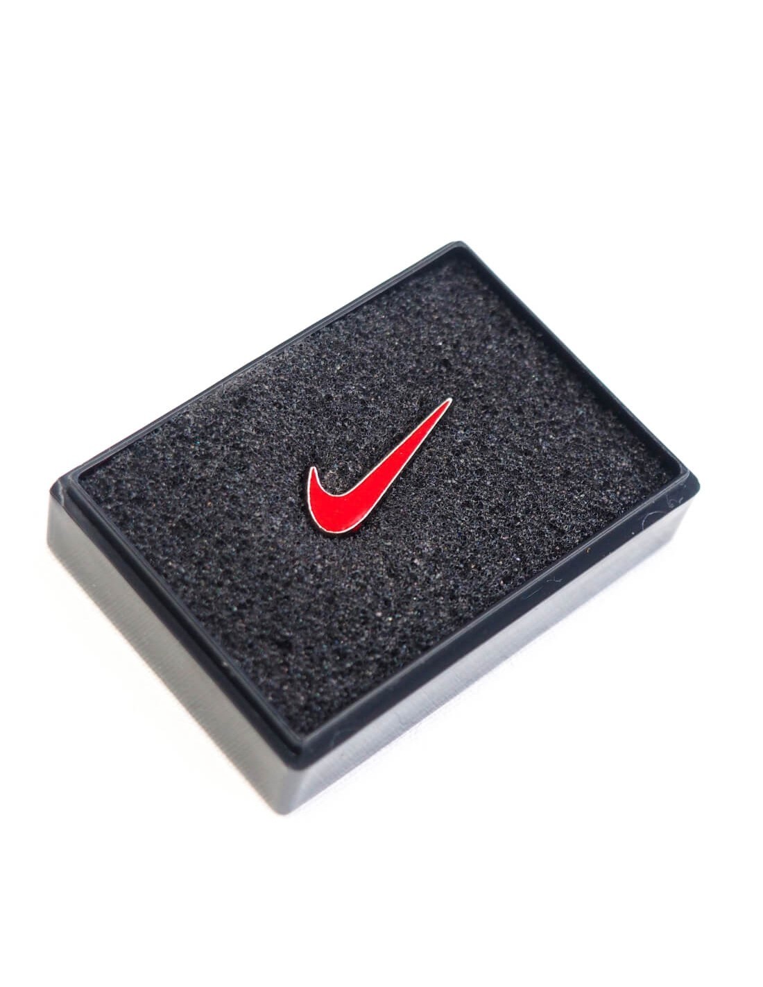pins nike swoosh red